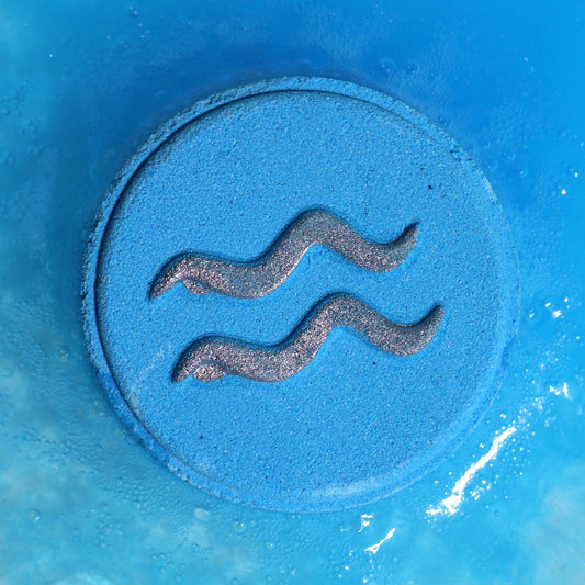 Blue bucket with a wavy line design on a blue background