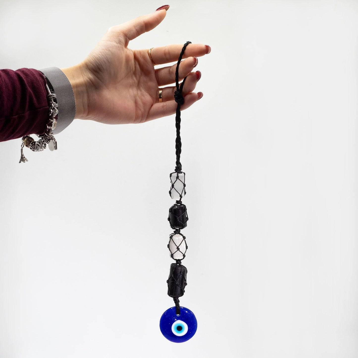 Hanging Stone Pendant - Black Torrmaline & Selonite Tumble- Evil Eye – lifestyle shot