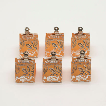 Agnes + Cat Lip Balm - Grapefruit – lifestyle shot