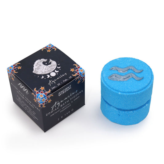 Blue cylindrical container with decorative lid and black box featuring zodiac symbols on a white background
