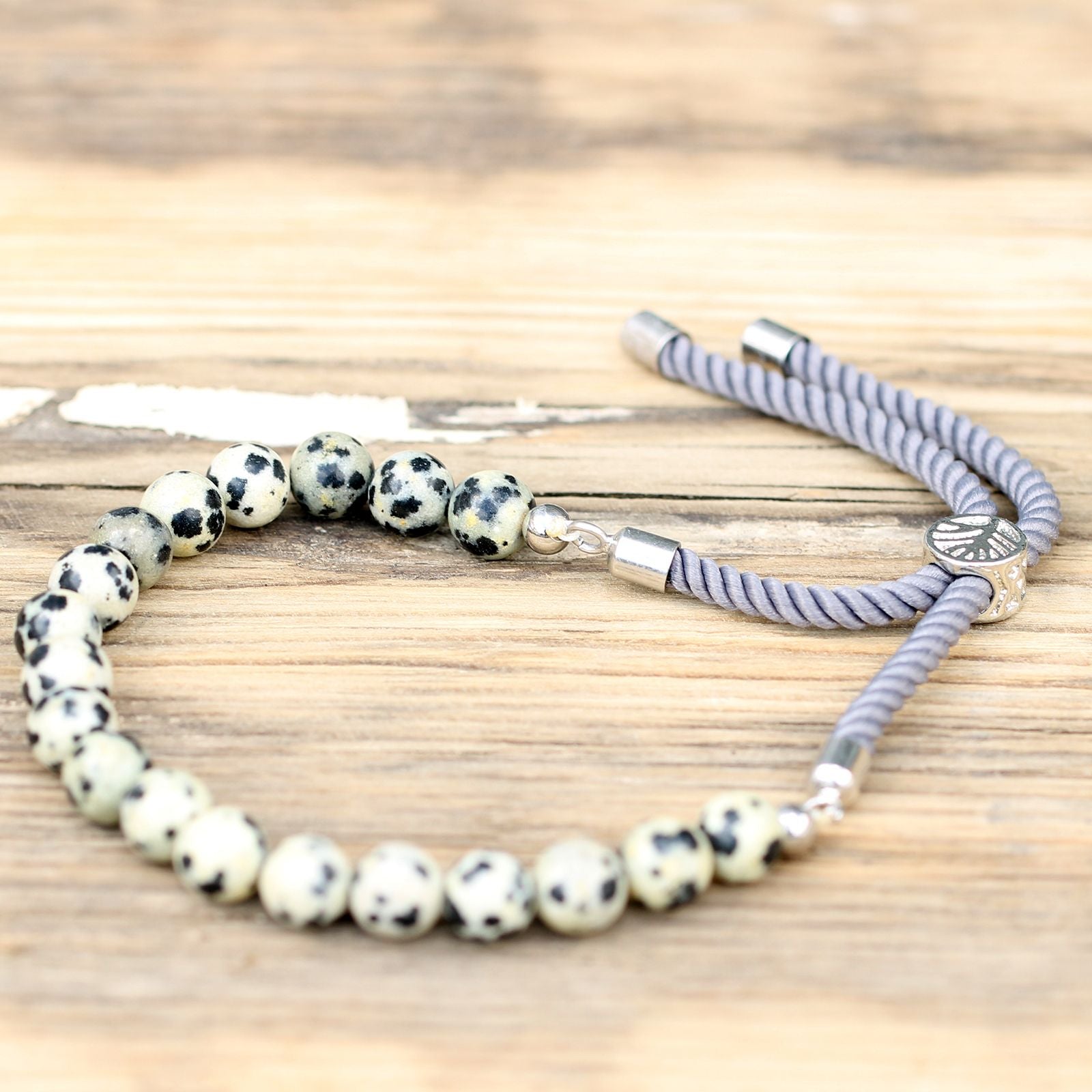 925 Silver Plated Gemstone Charcoal String Bracelet - Dalmatian Jasper – lifestyle shot