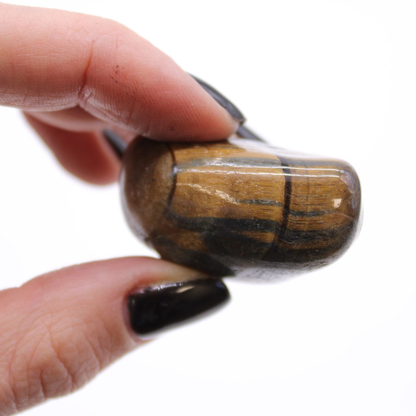 Medium African Tumble Stones - Tigers Eye - Varigated – lifestyle shot