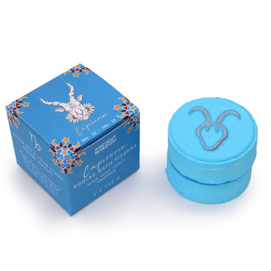Blue container with Capricorn symbol and packaging on a white background