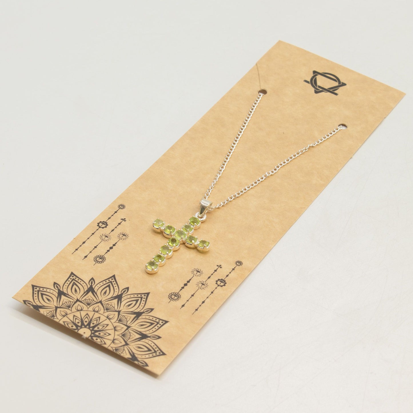 Indian Devotional Pendant - Silver Plated (45cm Chain)- Peridot Crucifix – packaging