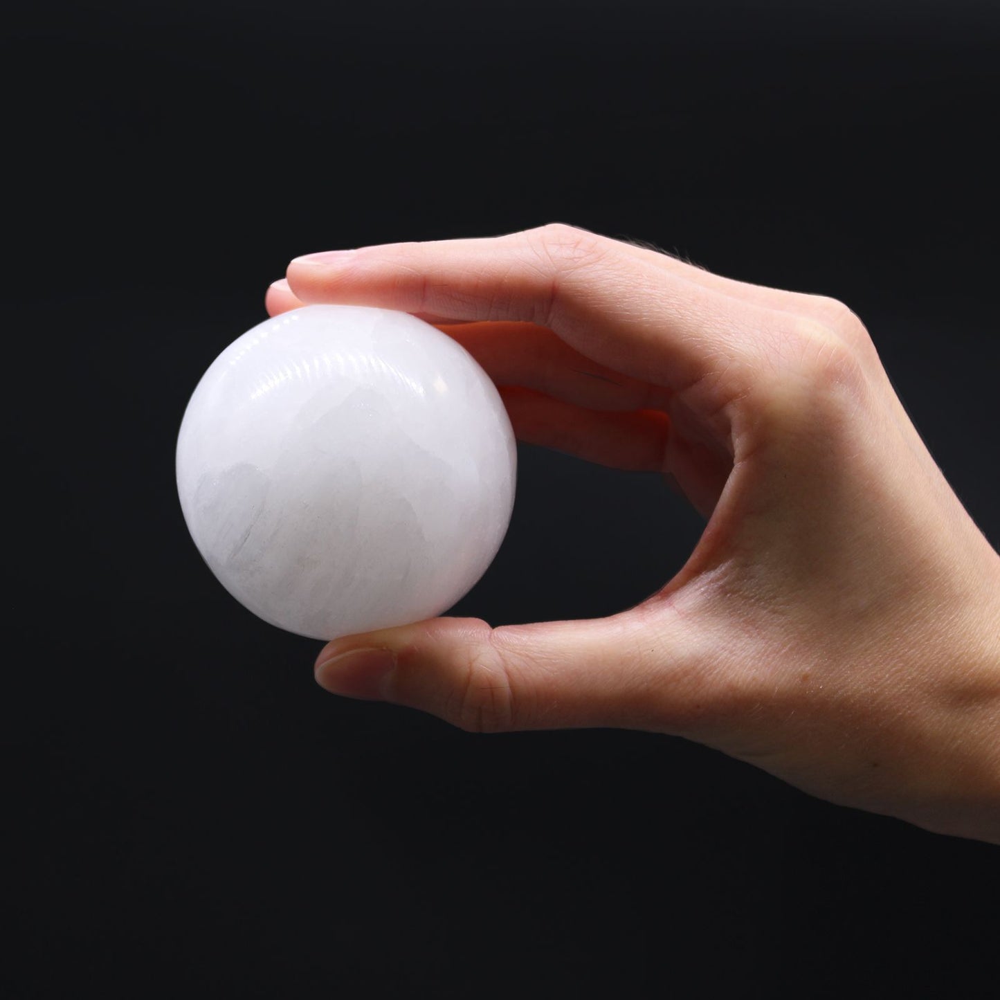 Selenite Sphere - 5-6 cm – lifestyle shot