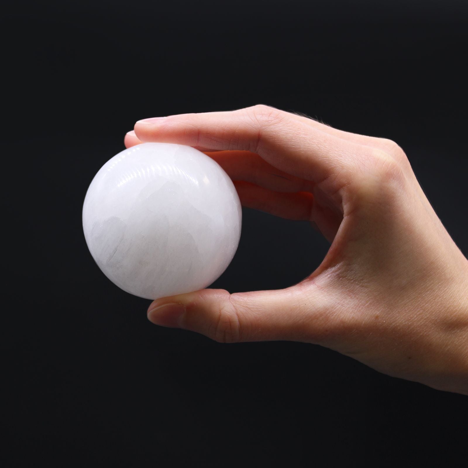 Selenite Sphere - 5-6 cm – lifestyle shot