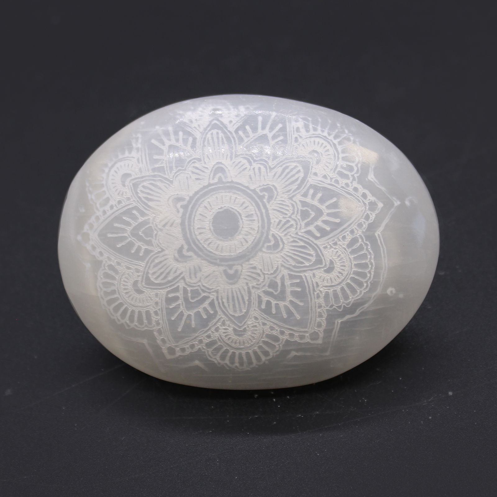 Selenite Palm Stone - Mandala Engraved – detail view