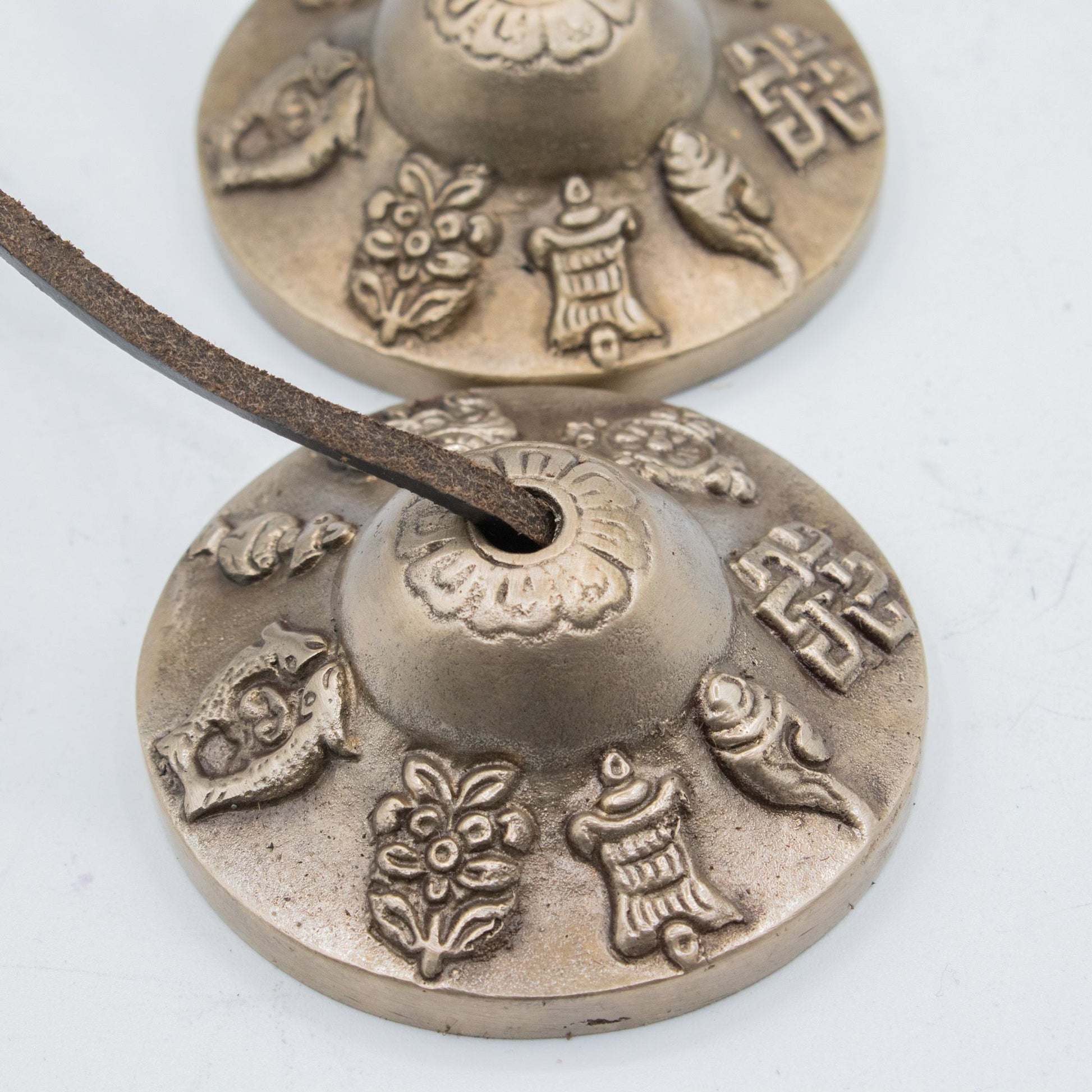 Premium Brass Tibetan Tingsha - Lucky Symbols - approx 6cm (155gm) – lifestyle shot