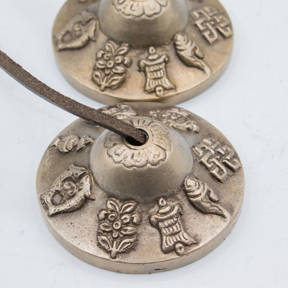 Premium Brass Tibetan Tingsha - Lucky Symbols - approx 6cm (155gm) – lifestyle shot