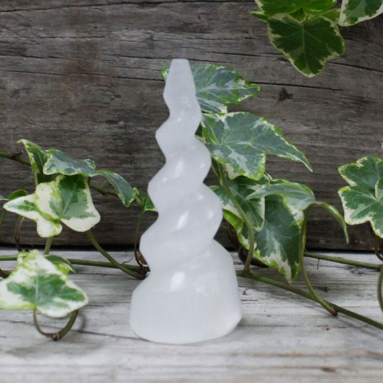 Selenite Spiral Unicorn Horn Tower - 10 cm – lifestyle shot